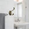 Premium Wall-Mounted Oval Plate Double Hook | Weathered Antique Copper Dual Robe & Towel Hanger with Decorative Contoured Prongs